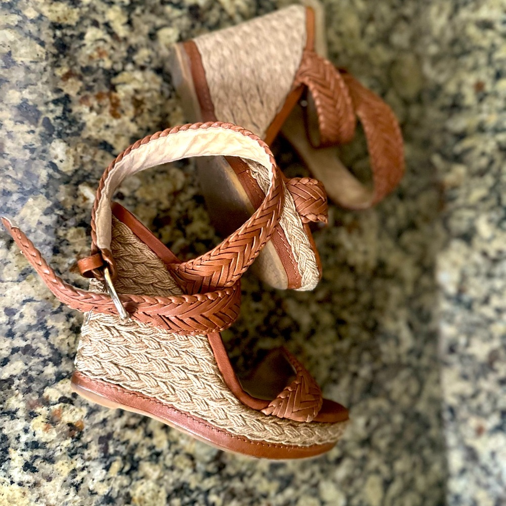Wedges by Stuart Weitzman . Woven straps and very comfy platform.
